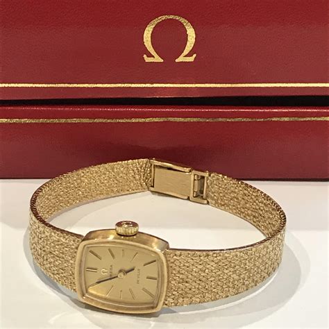 old omega ladies gold watches.